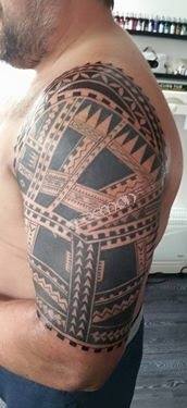 maori half sleeve and shoulder tattoo